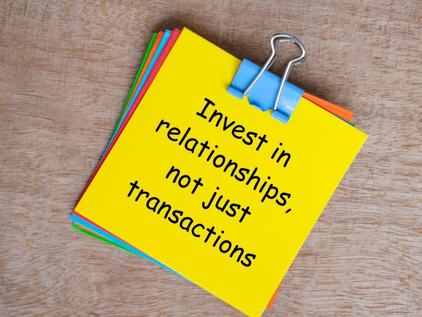 Invest,In,Relationships,,Not,Just,Transactions,Text,On,Yellow,Notepad.